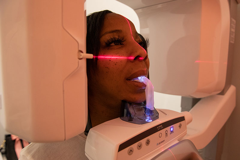 patient under going dental scan for treatment